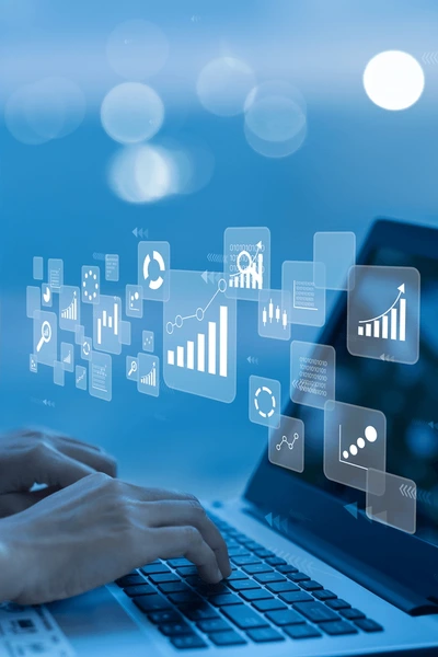 businesswoman-using-laptop-data-managementwith-600nw-2486123739